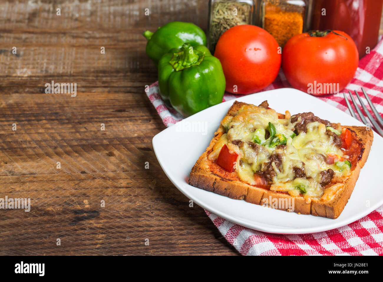 square mini pizza with vegetables and mushrooms Stock Photo