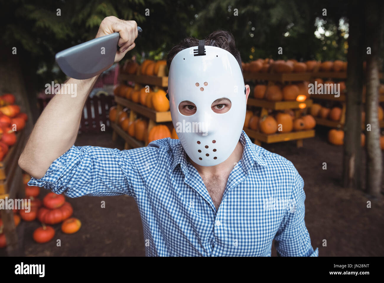 Man wearing halloween mask Stock Photo