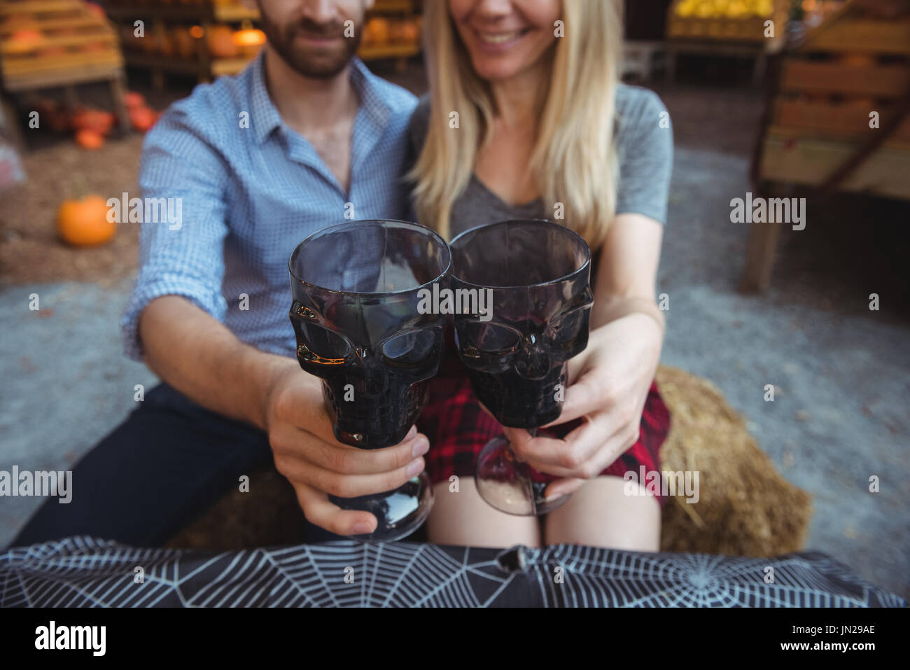 Couple toasting a glasses of wine Stock Photo