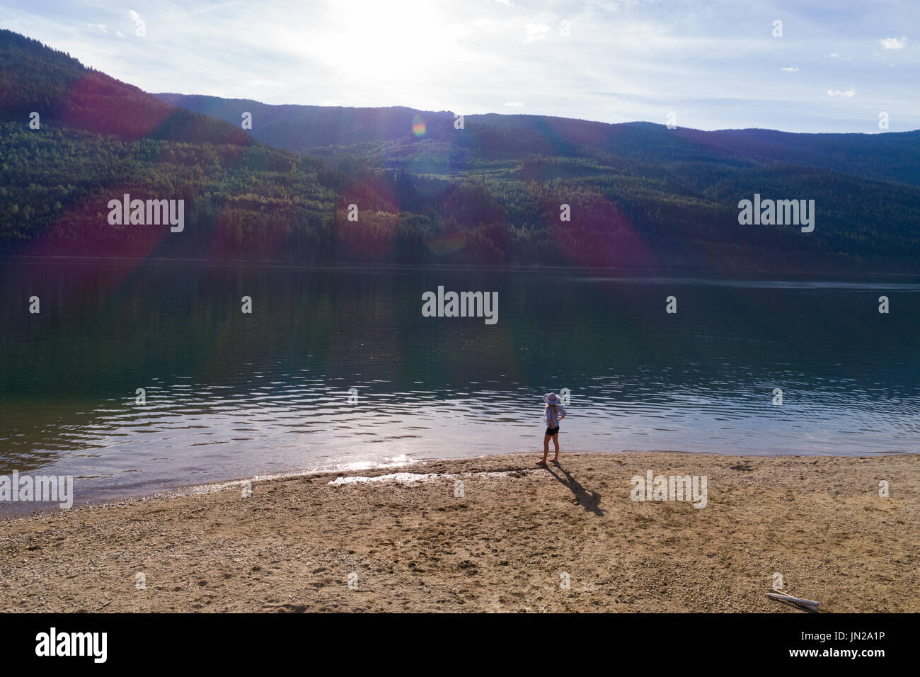 Woman on shore hi-res stock photography and images - Alamy