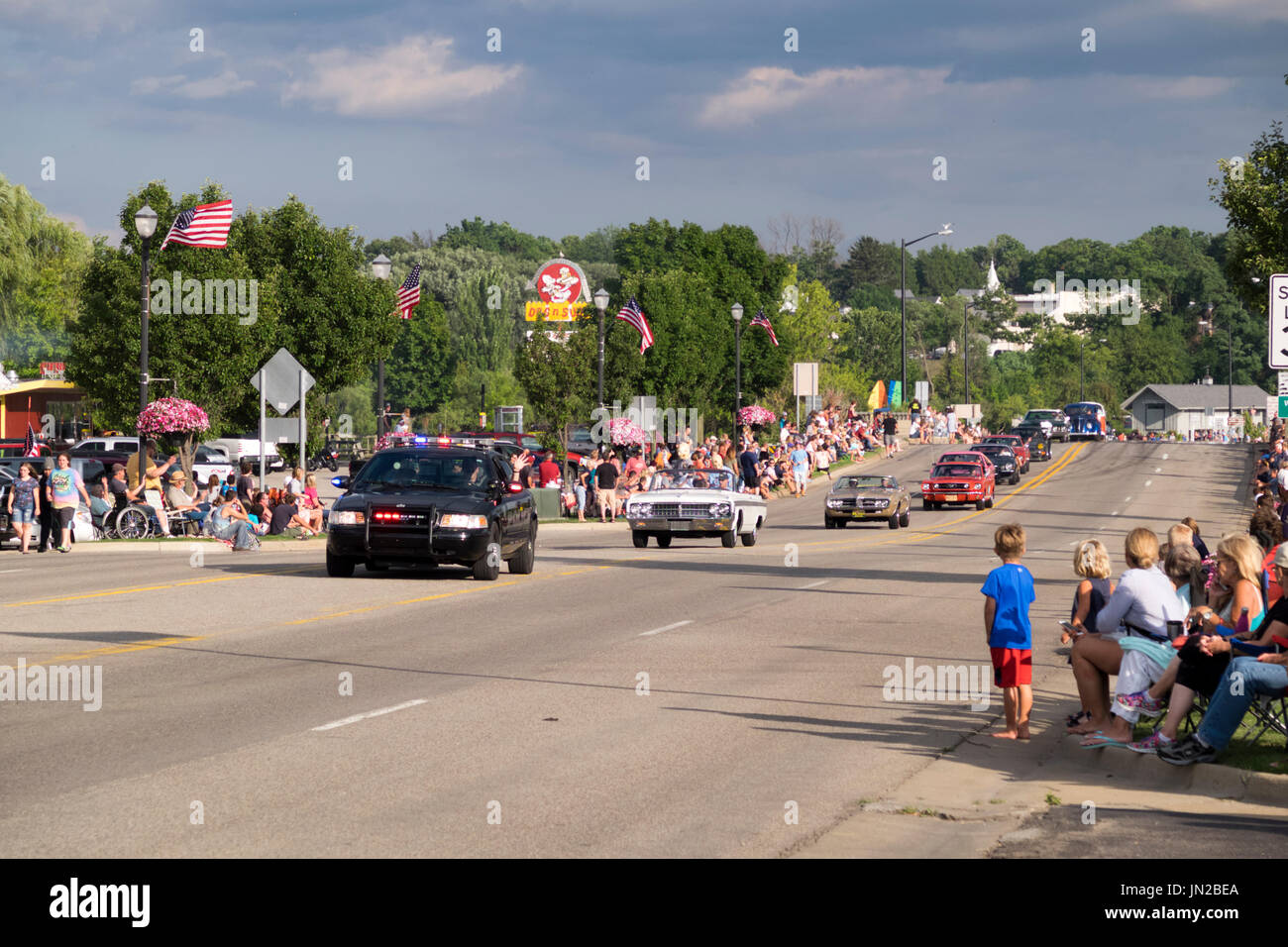 Beginning of the annual 'Cruz-In' antique car parade in downtown Montague, MI. Nearly 400 antique and vintage cars and trucks participated in this yea Stock Photo