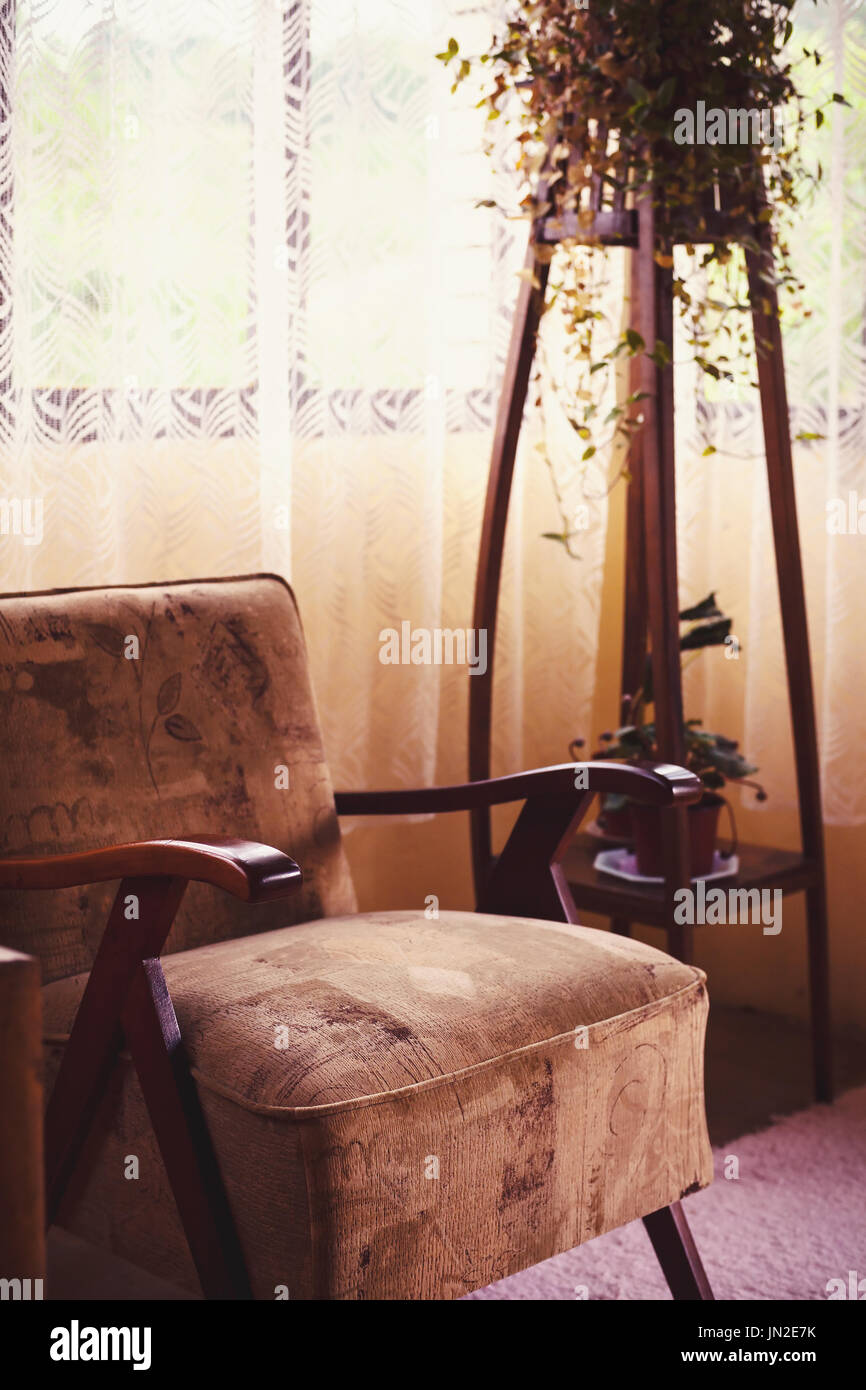 One wooden armchair, interior of a vintage style room Stock Photo - Alamy