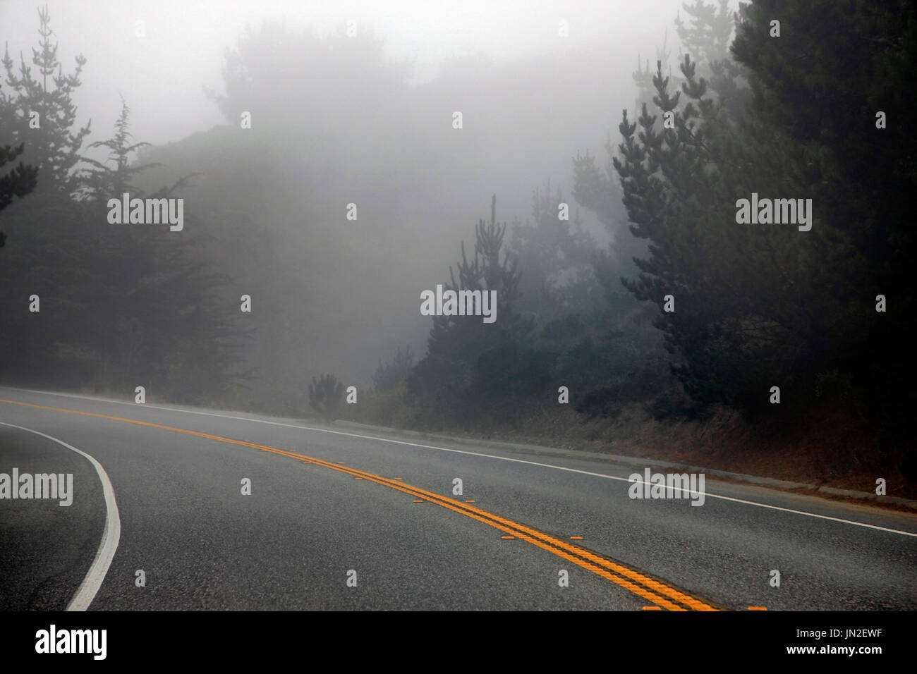 Road in the morning fog. California Stock Photo - Alamy