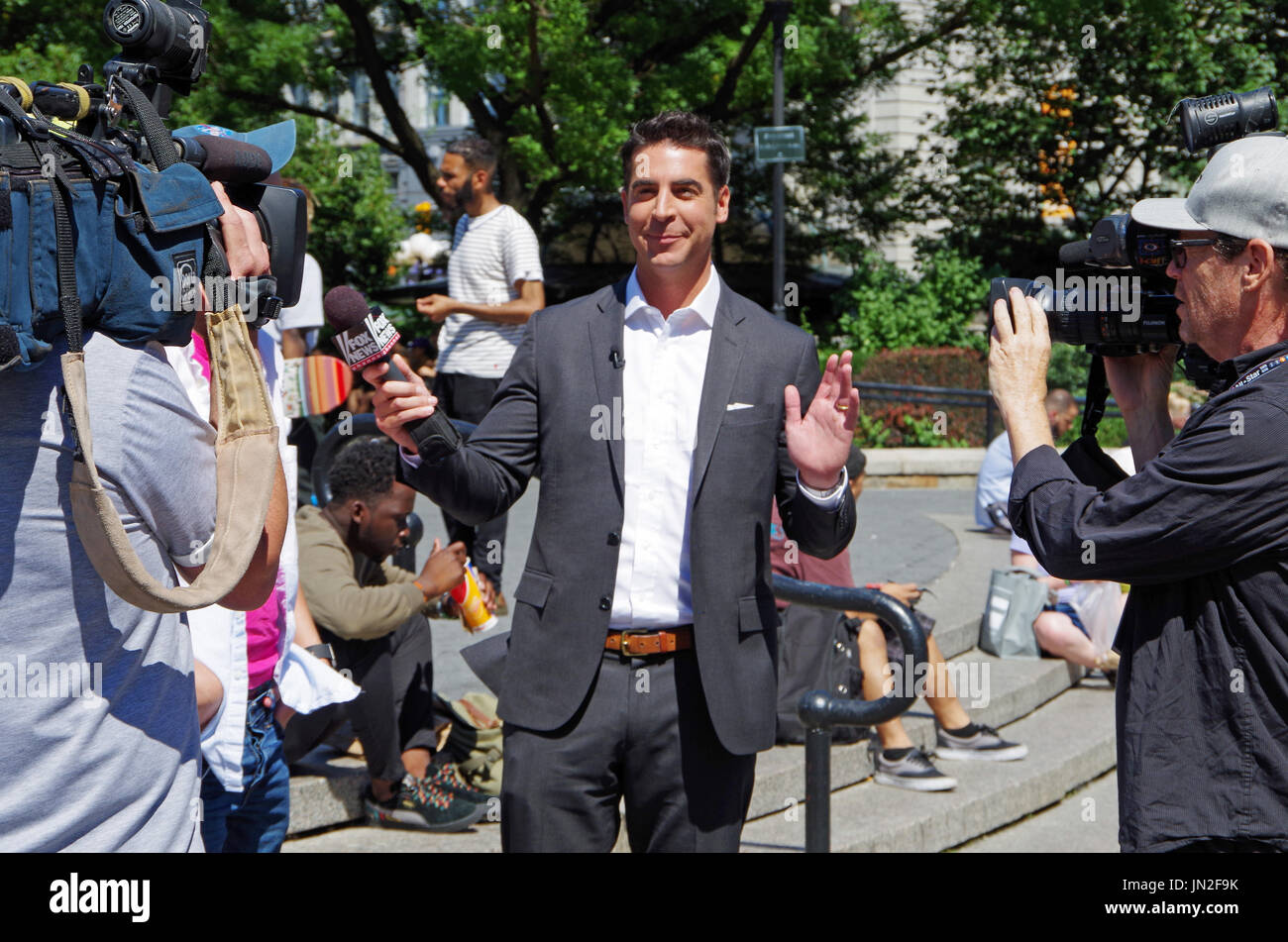 New York, New York-July Twenty Sixth, 2017: Jesse Watters from Fox News  conducting interviews in Union Square Park, NYC Stock Photo - Alamy