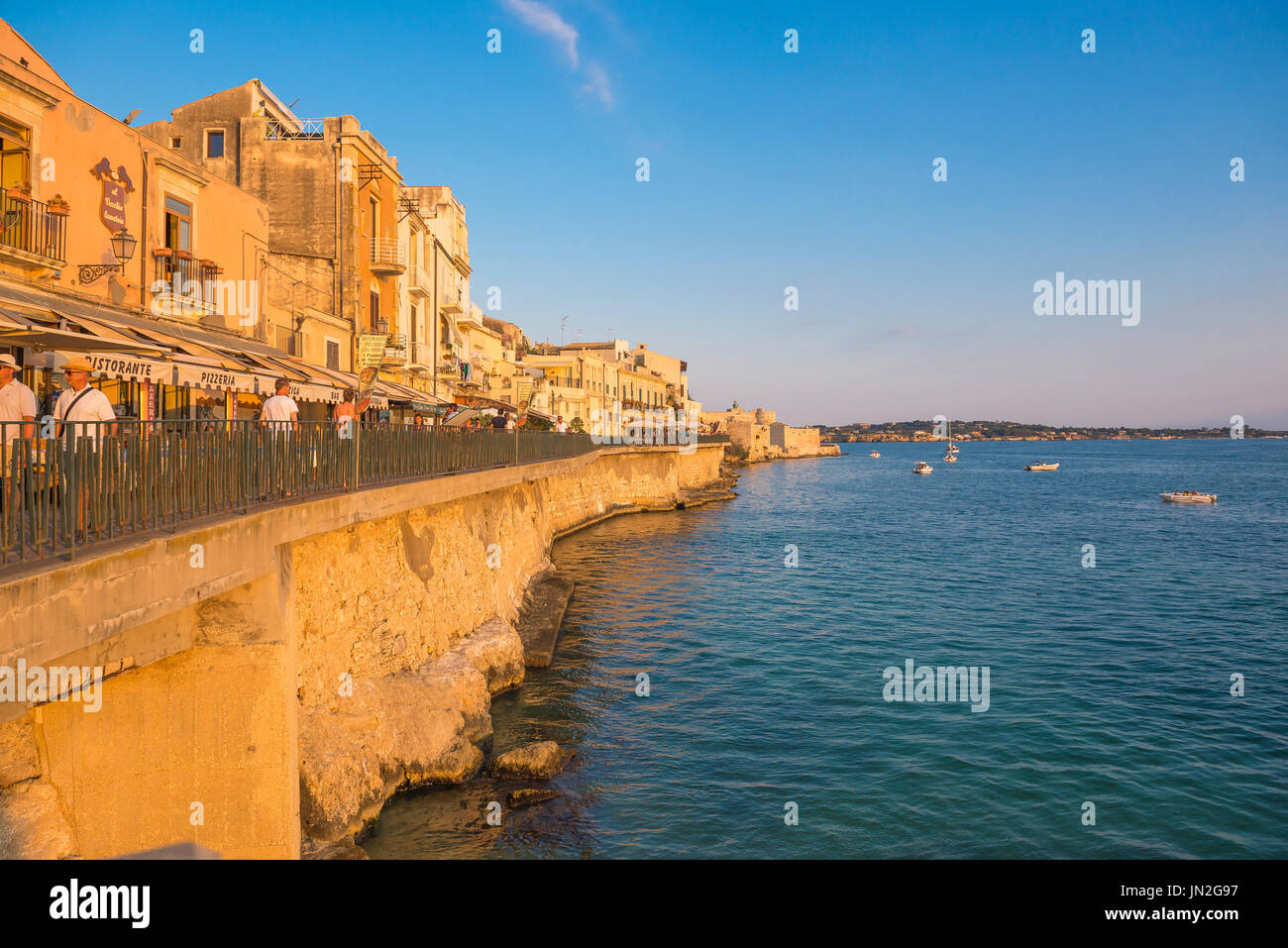 Sicily east coast, view of the sea wall on Ortigia island near Syracuse in Sicily. Stock Photo