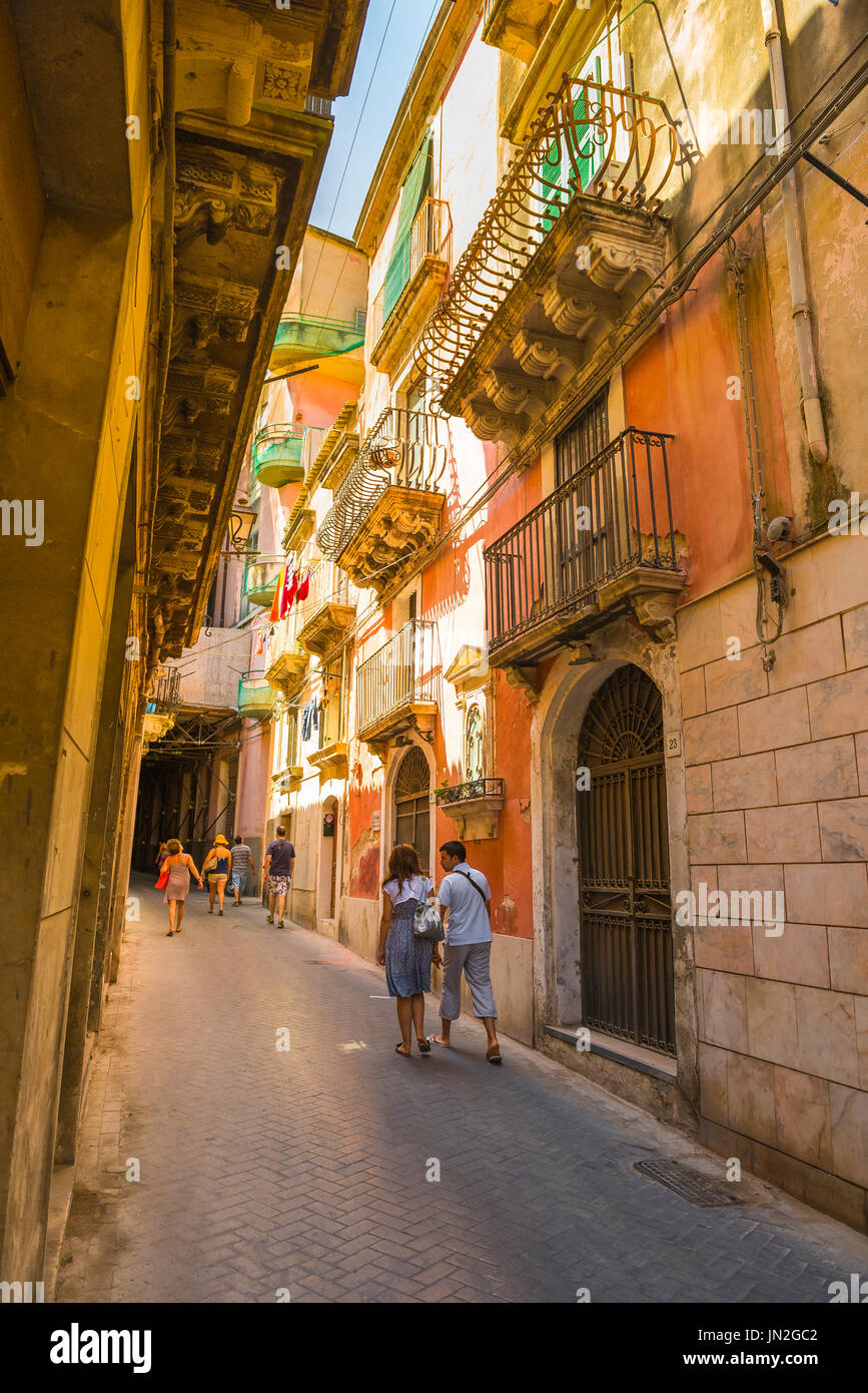 Syracuse Sicily old town, view of a young couple exploring the