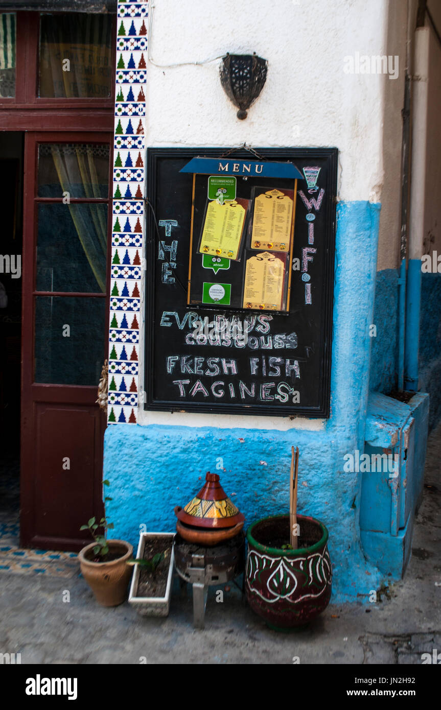 Morocco, North Africa: the blackboard with the menu of one of the restaurants of the Medina area in the old town of Tangier Stock Photo