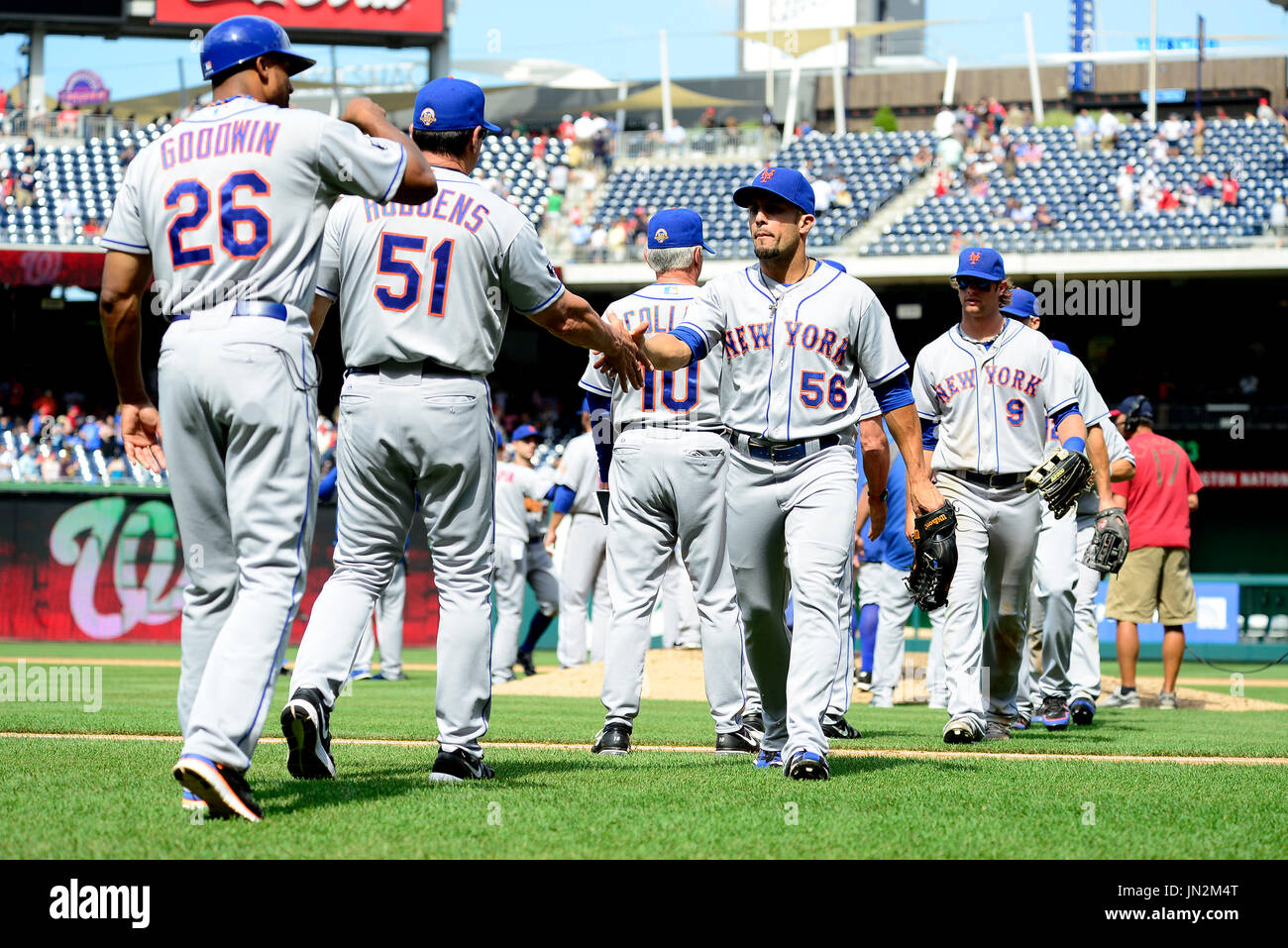 New York Mets players and coaches celebrate their 3 1 victory over