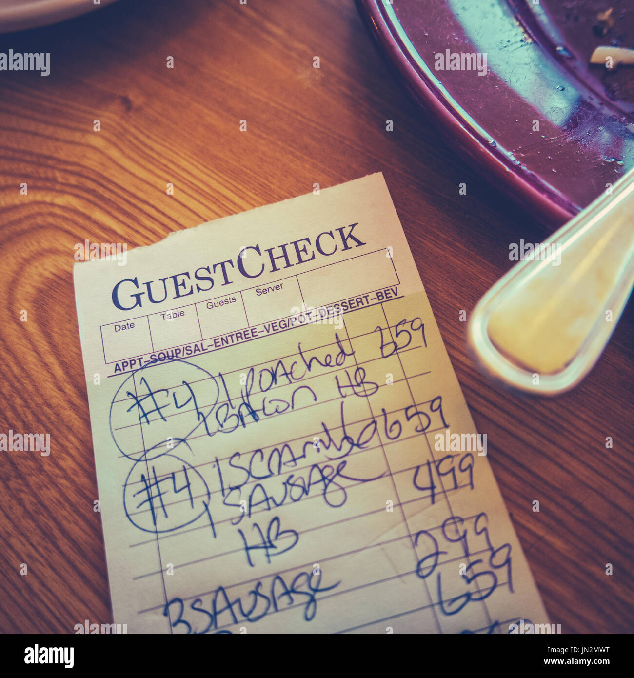 Retro Filtered Check At A Breakfast Diner Stock Photo