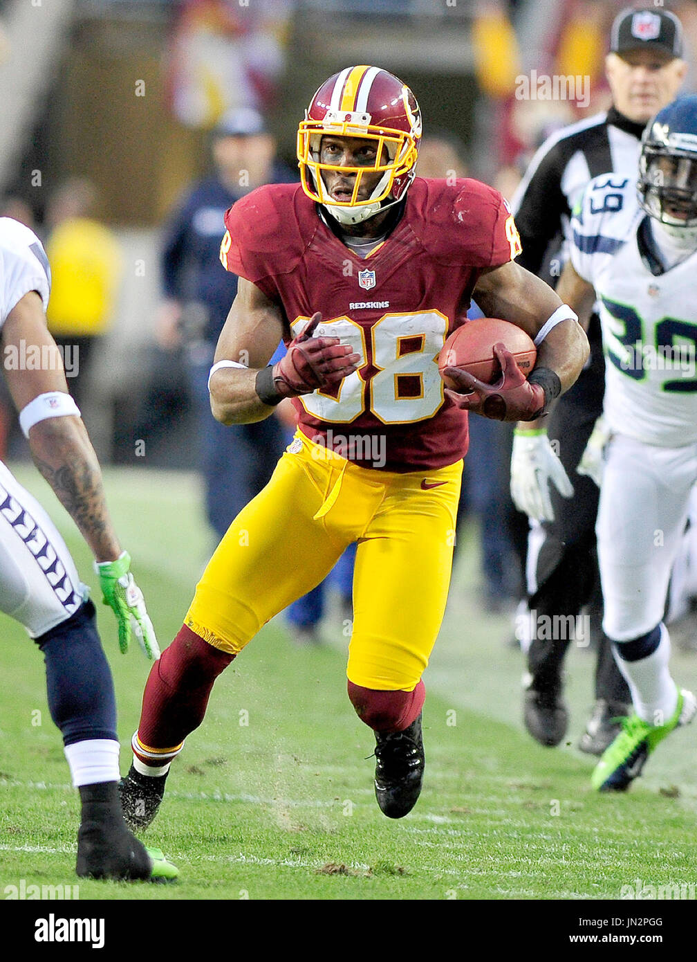 Washington Redskins wide receiver Pierre Garcon (88) looks for extra yardage after making a catch during the Redskins' first drive of the first quarter against the Seattle Seahawks during an NFC Wild-card play-off game at FedEx Field in Landover, Maryland on Sunday, January 6, 2013.  The Seahawks won the game 24 - 14..Credit: Ron Sachs / CNP Stock Photo