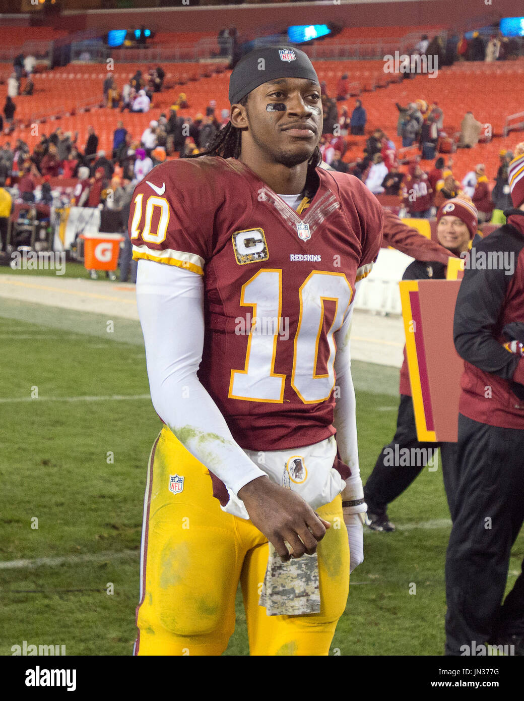 Washington Redskins quarterback Robert Griffin III (10) leaves the ...