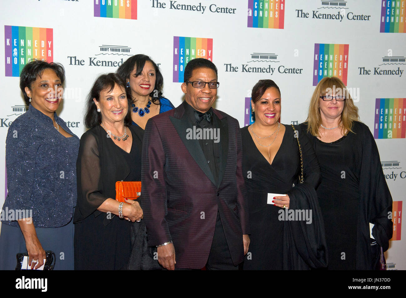 Herbie Hancock, his wife, Gigi, and their family arrive for the formal