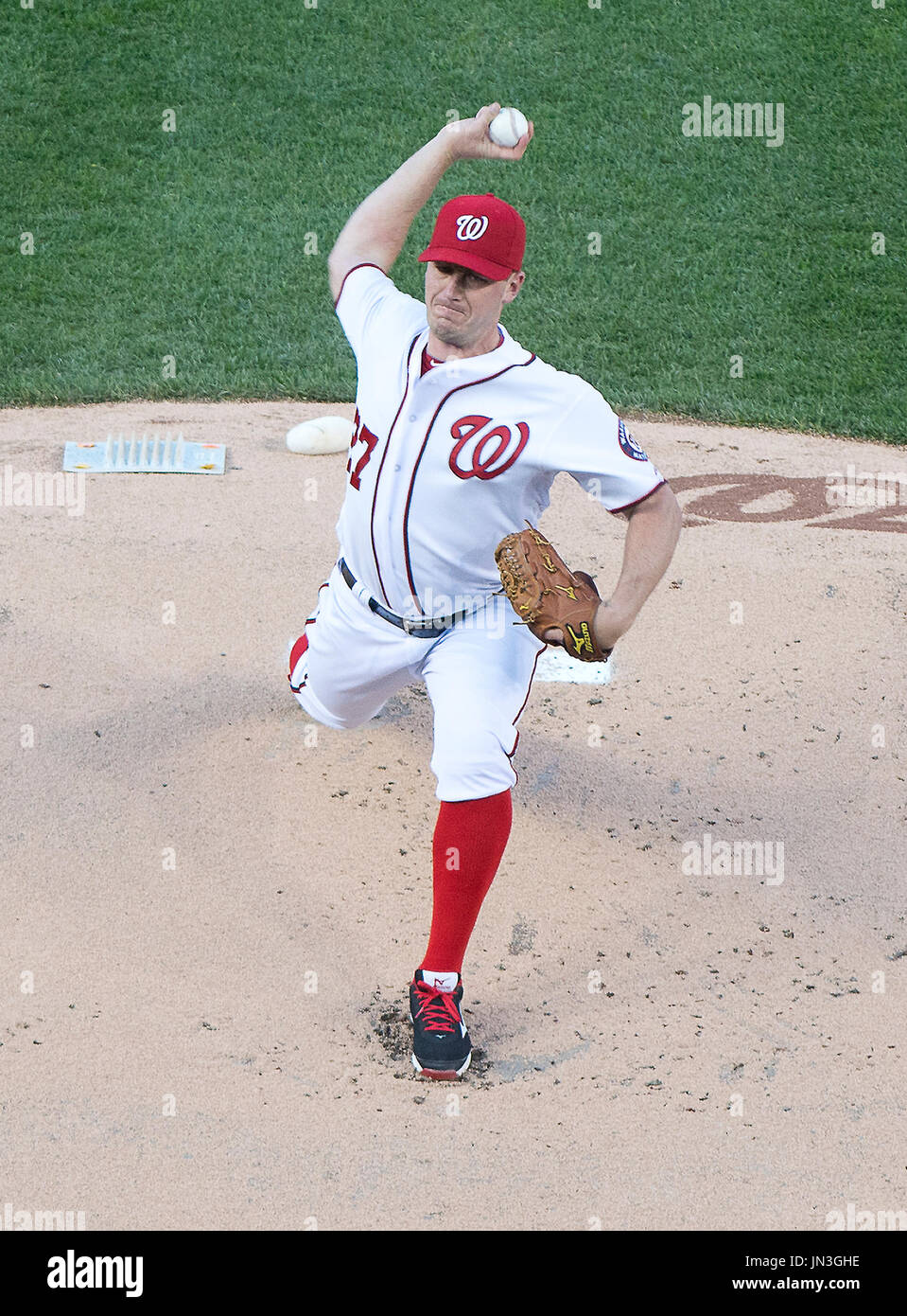 Washington Nationals starting pitcher Jordan Zimmermann (27) pitches in the first inning against the Miami Marlins at Nationals Park in Washington, D.C. on Wednesday, April 9, 2014.  Zimmermann was removed from the game after allowing five runs on seven hits in 1 2/3 innings.  Credit: Ron Sachs / CNP Stock Photo