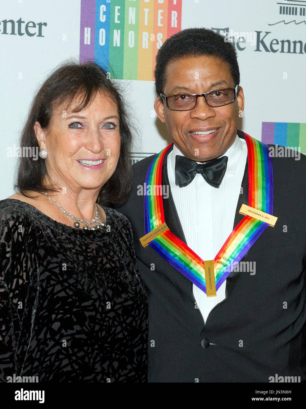 2013 Kennedy Center honoree Herbie Hancock and his wife, Gigi, arrive