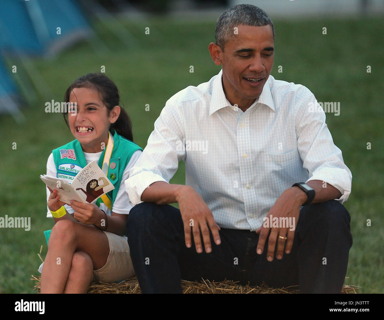 Shell Obama Giirl United States President Barack Obama sits next to Girl Scout Daphnye ...