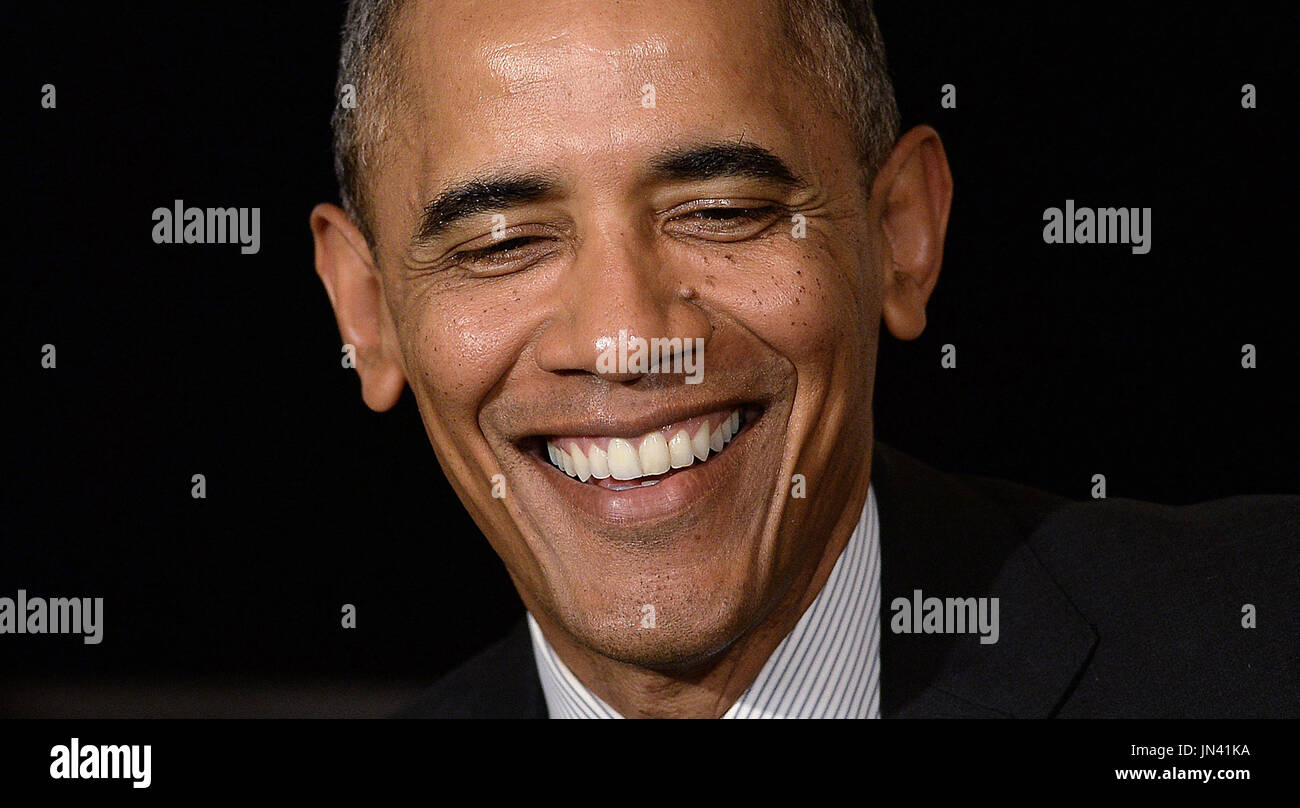 United States President Barack Obama delivers remarks and answers ...