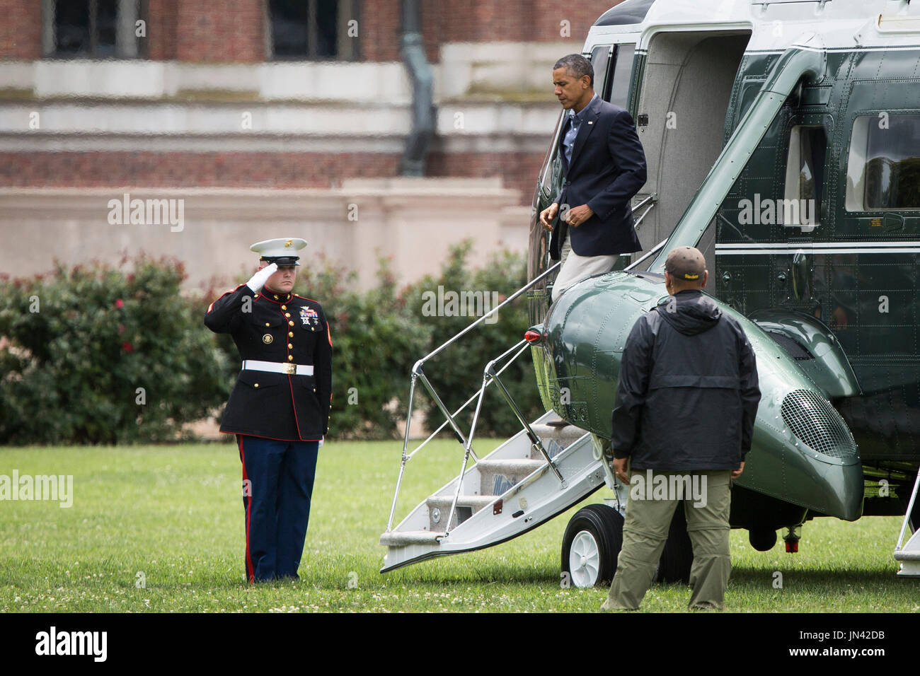 United States President Barack Obama exits Marine One at Fort Lesley J. McNair in Washington, D.C., as he returns from a week-end Camp David, Sunday, August  3, 2014.  Credit: Drew Angerer / Pool via CNP Stock Photo