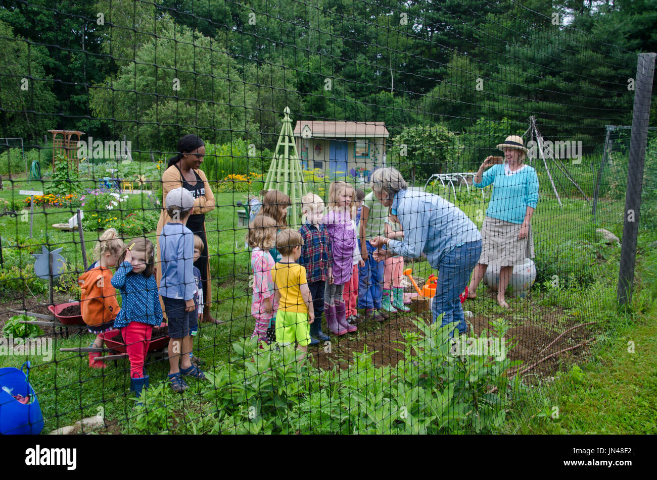 Class in community Garden, Yarmouth Maine, USA Stock Photo