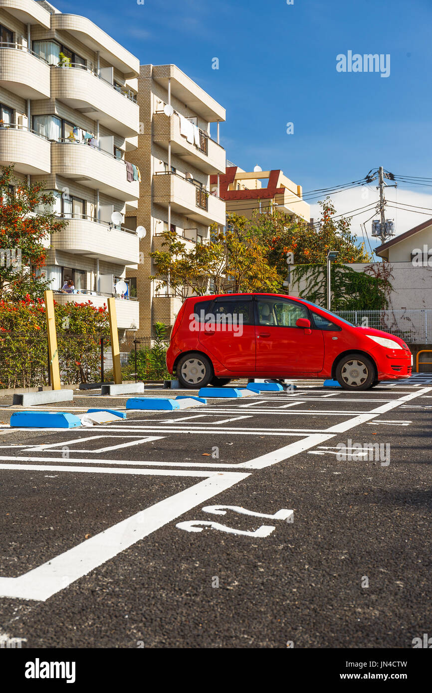 Red car park in the lot Stock Photo Alamy