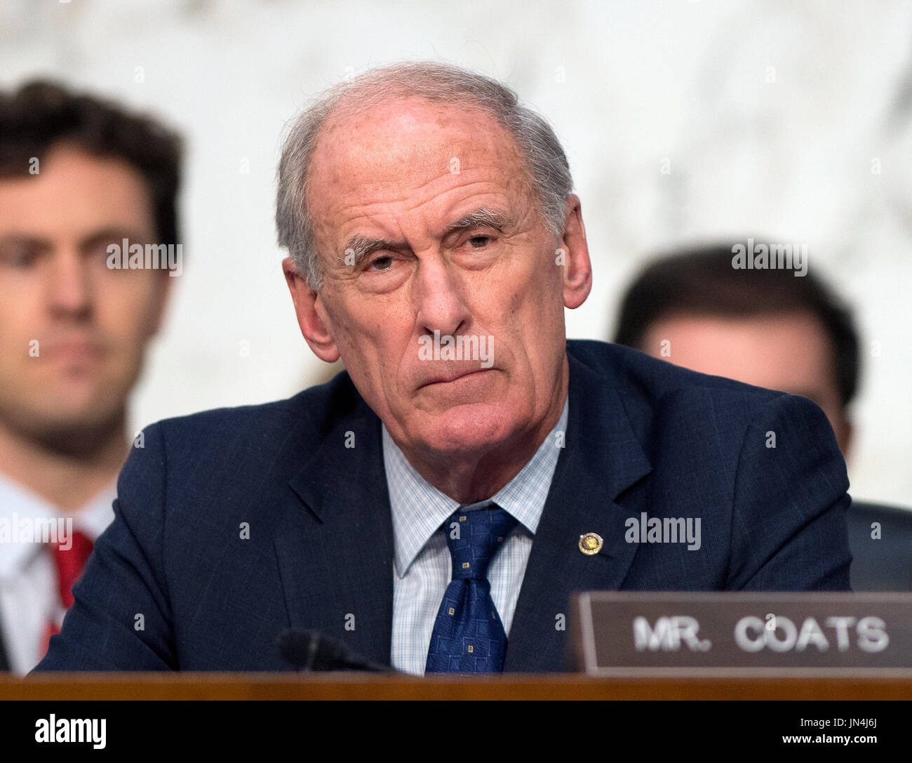 Huncoat Senator United States Senator Dan Coats (Republican of Indiana) listens as ...