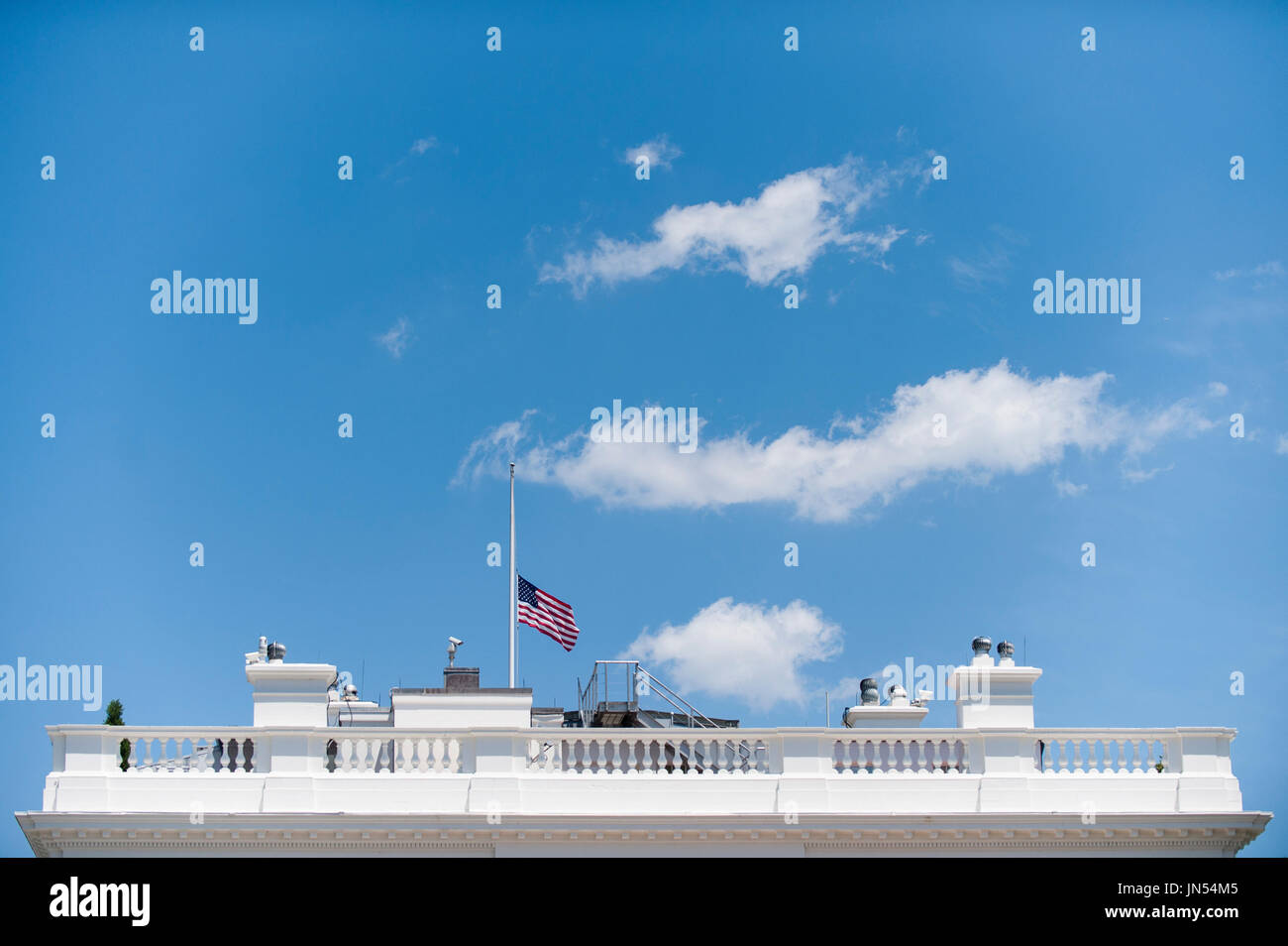 The American flags that fly over the White House in Washington, DC are lowered to half staff following United States President Barack Obama's remarks to reporters in the Brady Press Briefing Room in Washington, District of Columbia, U.S., on Sunday, June 12, 2016, about the deadly shooting the night before in a gay nightclub in Orlando FL. Approximately 50 people were killed and at least 53 more were injured in what appears to be the deadliest mass shooting in U.S. history.  Credit: Pete Marovich / Pool via CNP Stock Photo