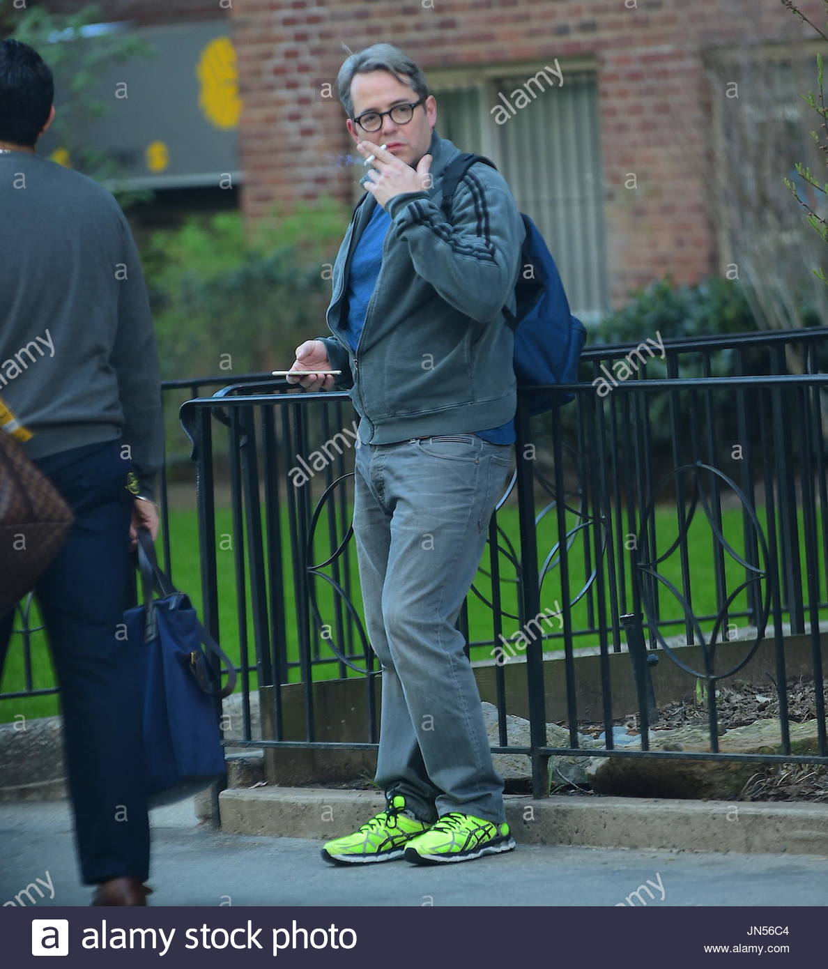 Matthew Broderick smoking a cigarette (or weed)
