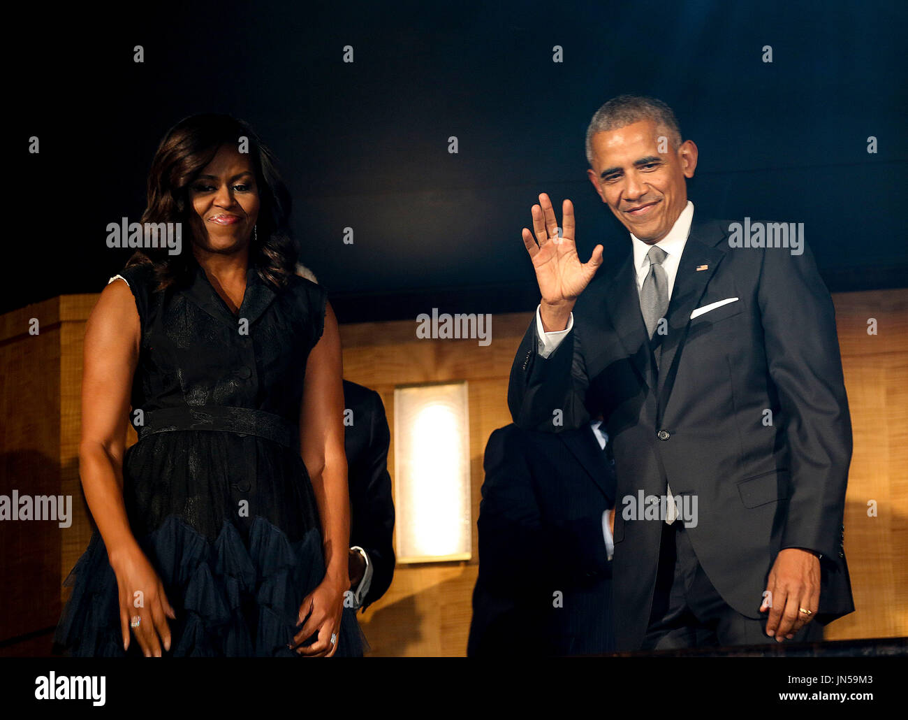US President Barack Obama and First Lady Michelle Obama attend a