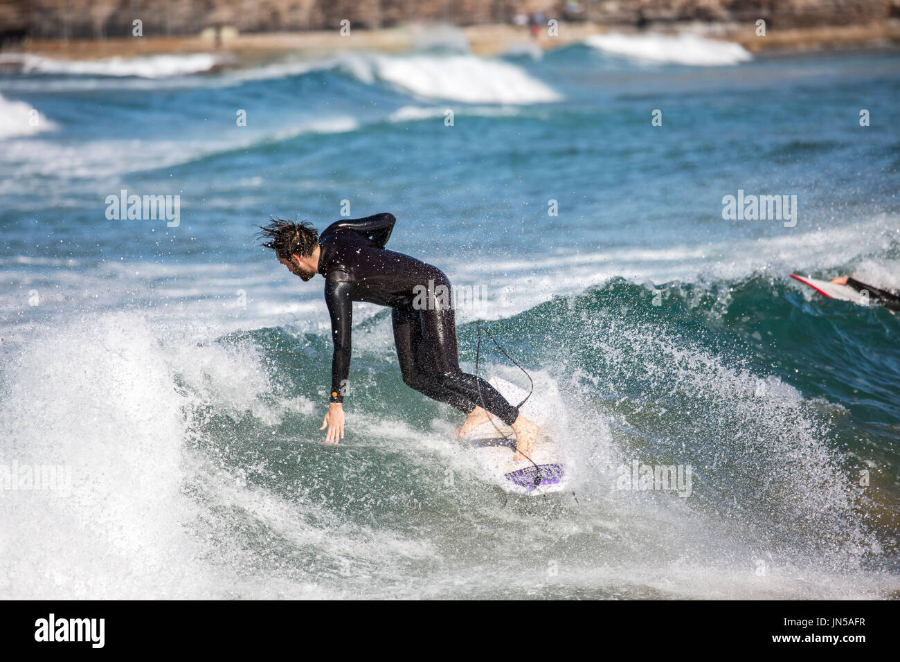 Surfing australia wetsuit hi-res stock photography and images - Alamy