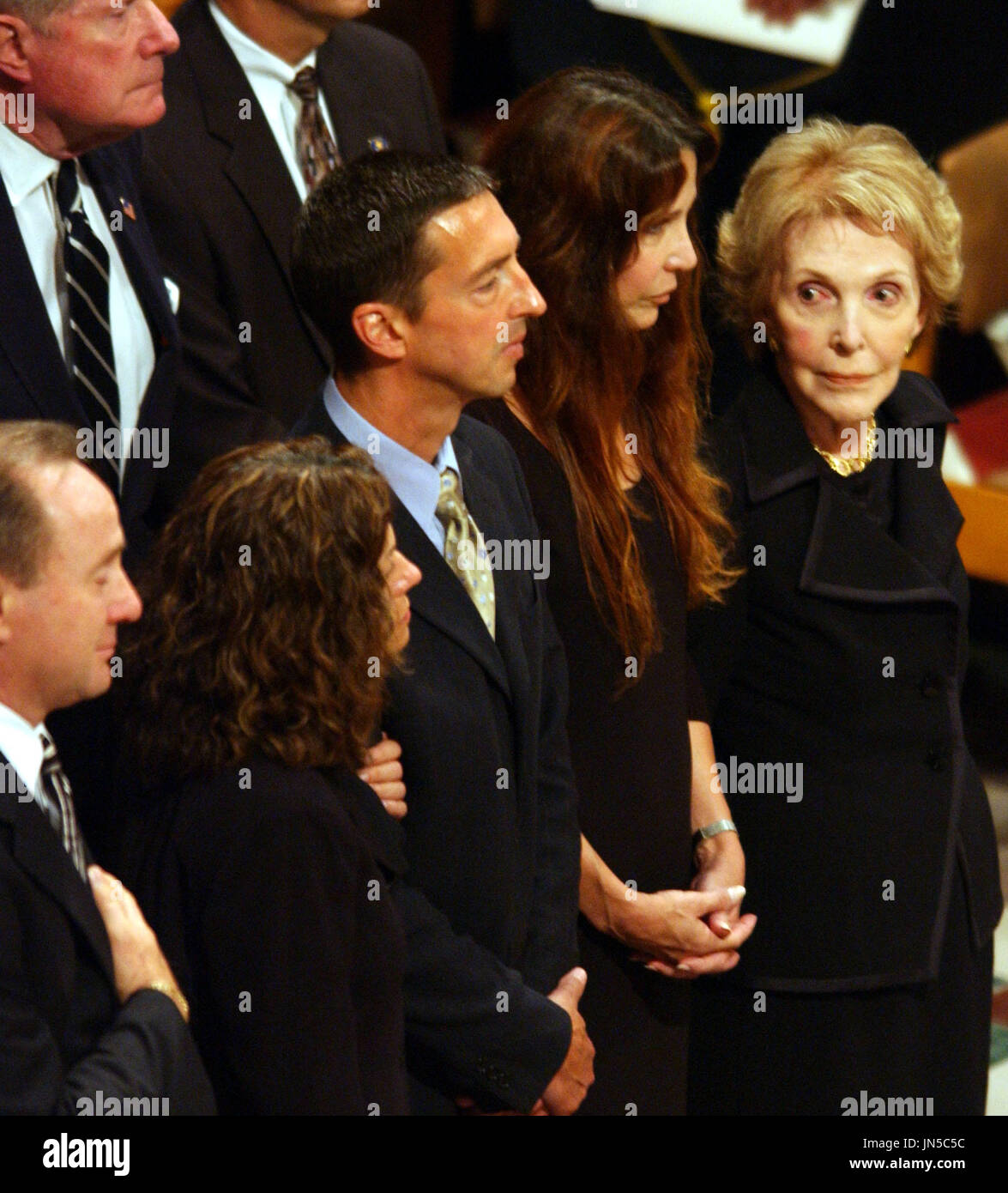 Former first lady Nancy Reagan, right, looks at her family at Ronald ...