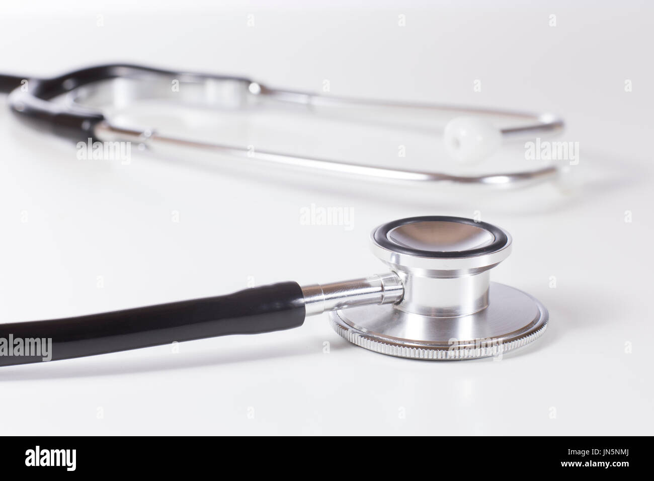 Close up detail of the disc on a stethoscope used to listen to the