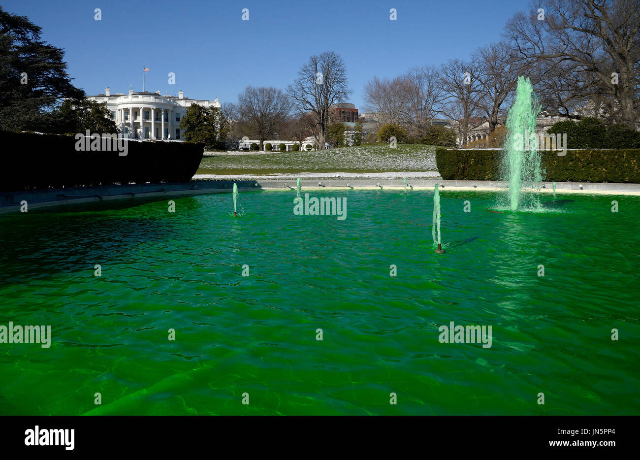 Fountain on the South side of the White House is dyed green for St. Patrick's Day in Washington D.C.,on March 16, 2017 in Washington, DC.  Credit: Olivier Douliery / Pool via CNP Stock Photo