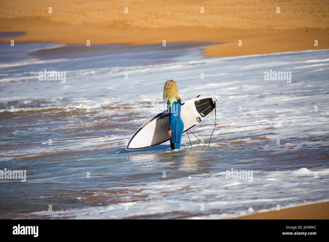 Young woman surfboard hi-res stock photography and images - Alamy