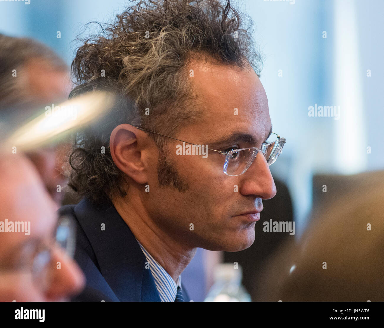 Palantir Technologies CEO Alex Carp is seen at a meeting of technology