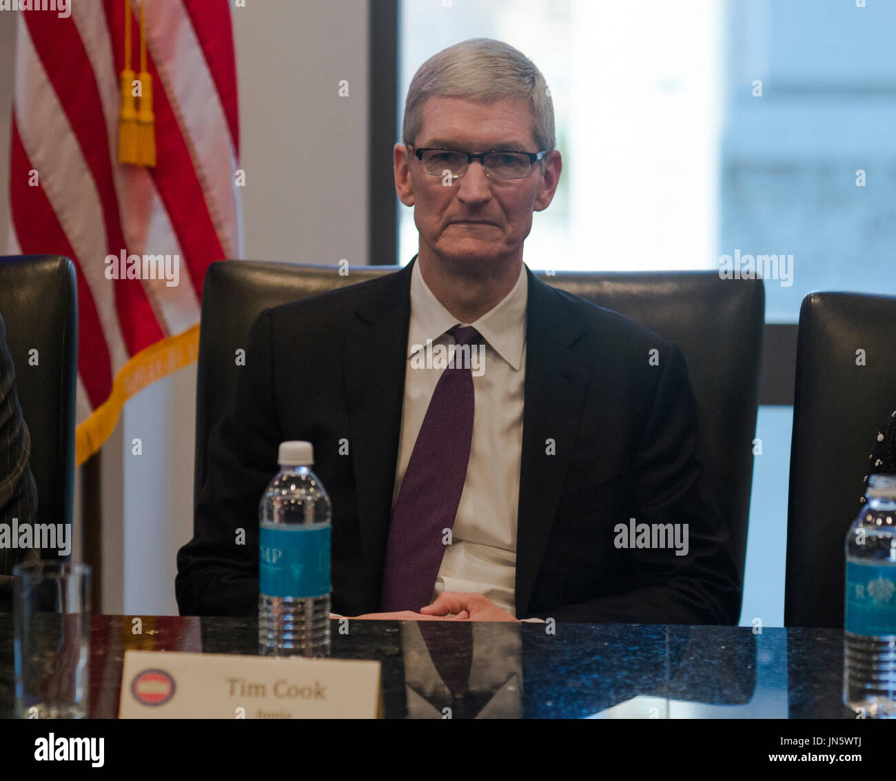 Apple CEO Tim Cook is seen at a meeting of technology leaders in the ...