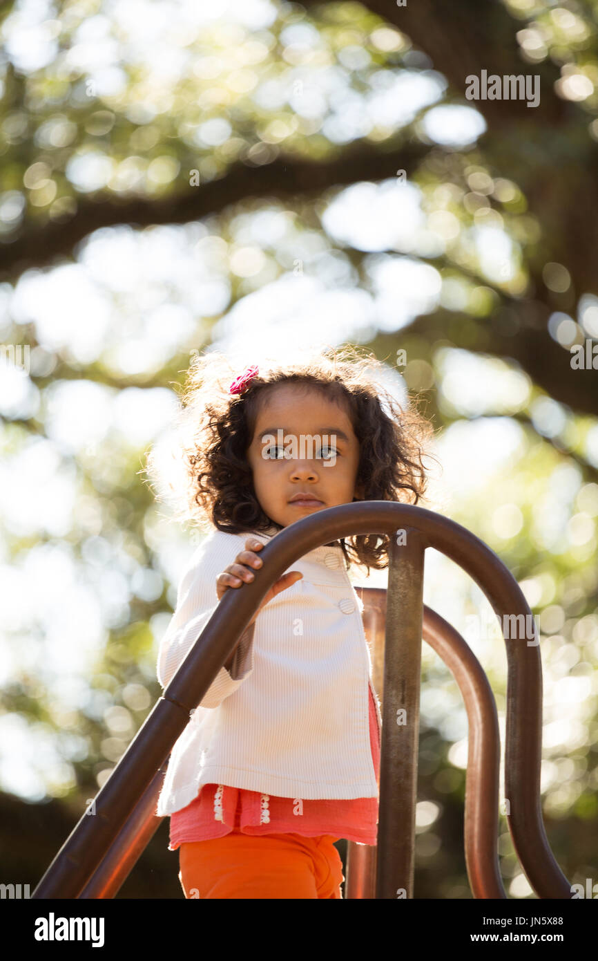 Little girl playing at the park Stock Photo - Alamy