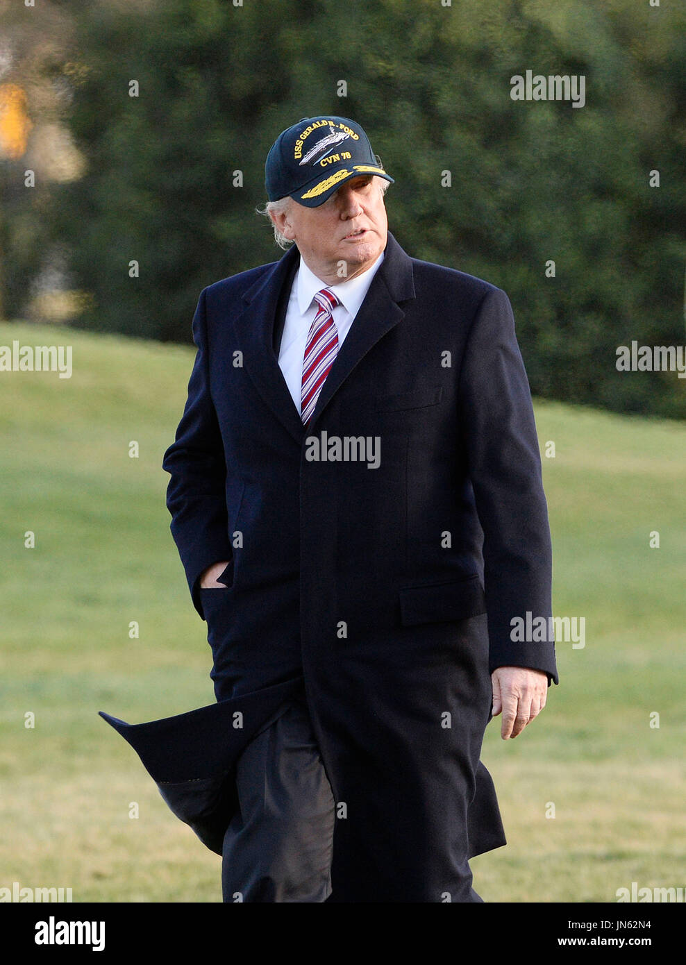 United States President Donald J. Trump walks back to the Oval Office ...