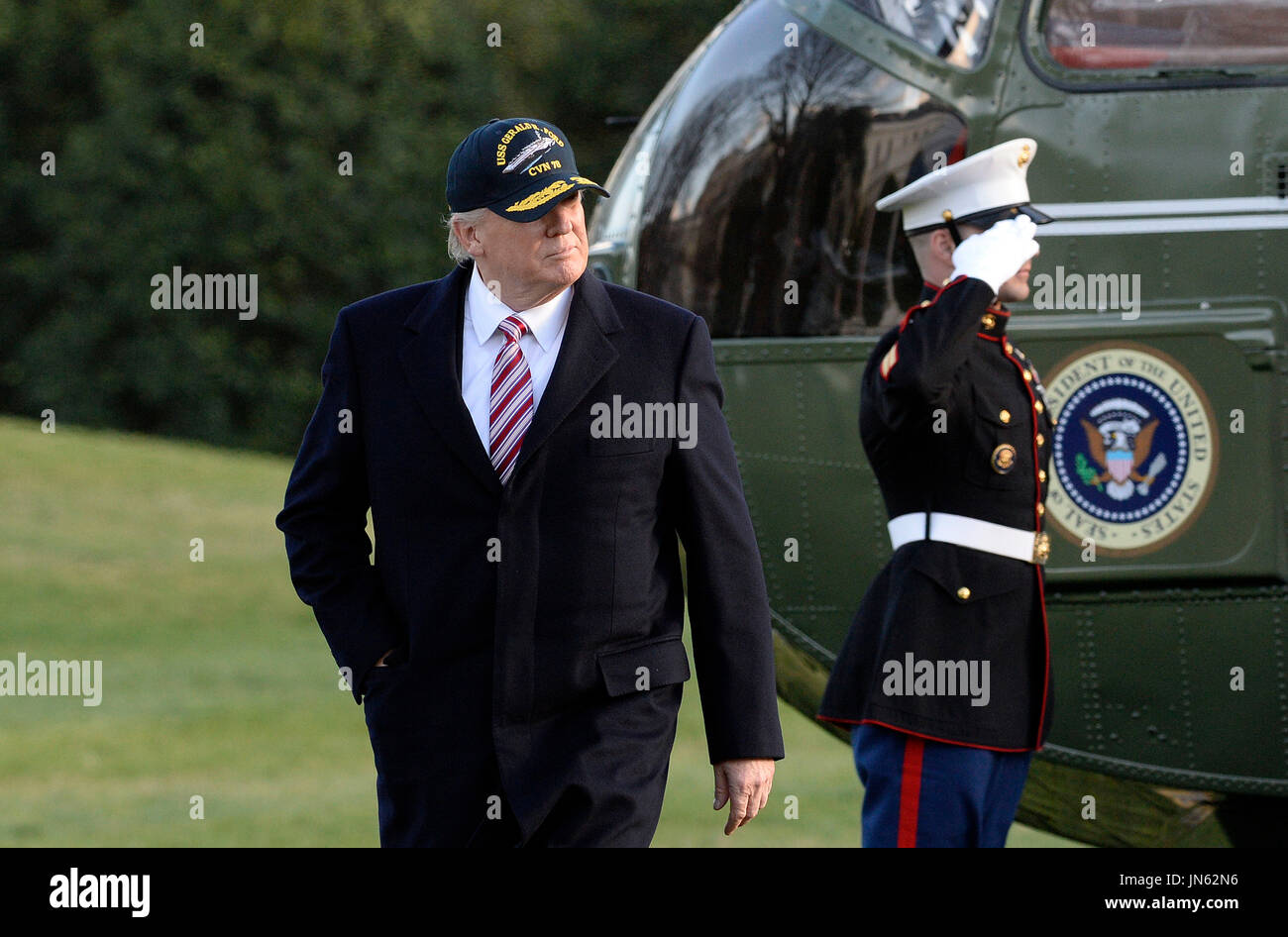 United States President Donald J. Trump walks back to the Oval Office ...