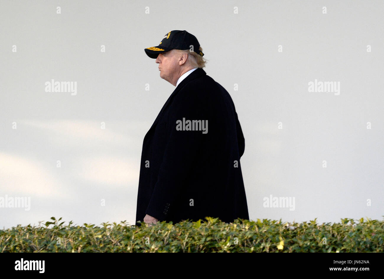 United States President Donald J. Trump walks back to the Oval Office ...
