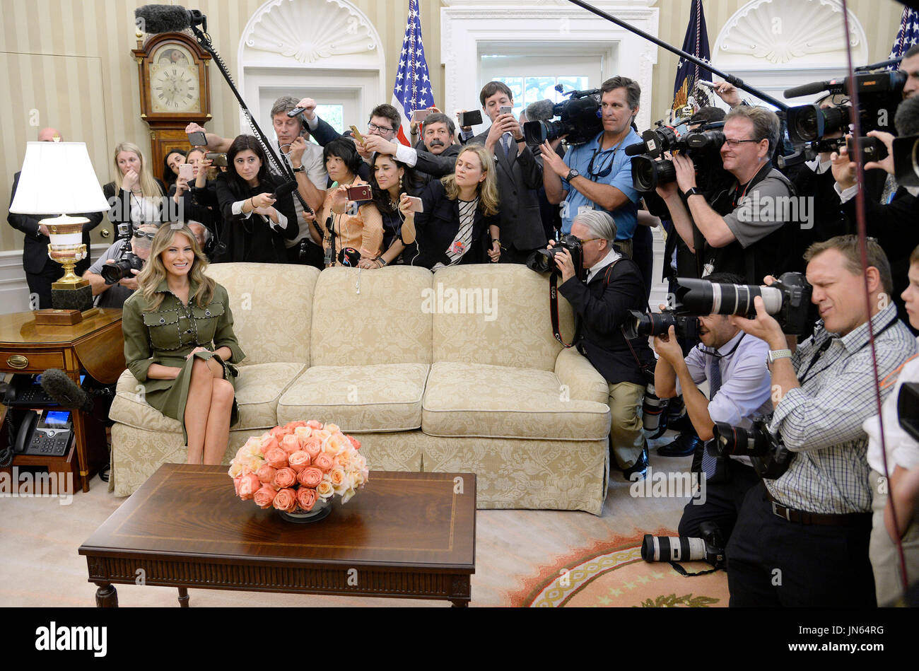 First Lady Melania Trump looks on during a meeting with President Mauricio Macri of Argentina in the Oval Office of the White House  in Washington, DC, on April 27, 2017.  Credit: Olivier Douliery / Pool via CNP Stock Photo