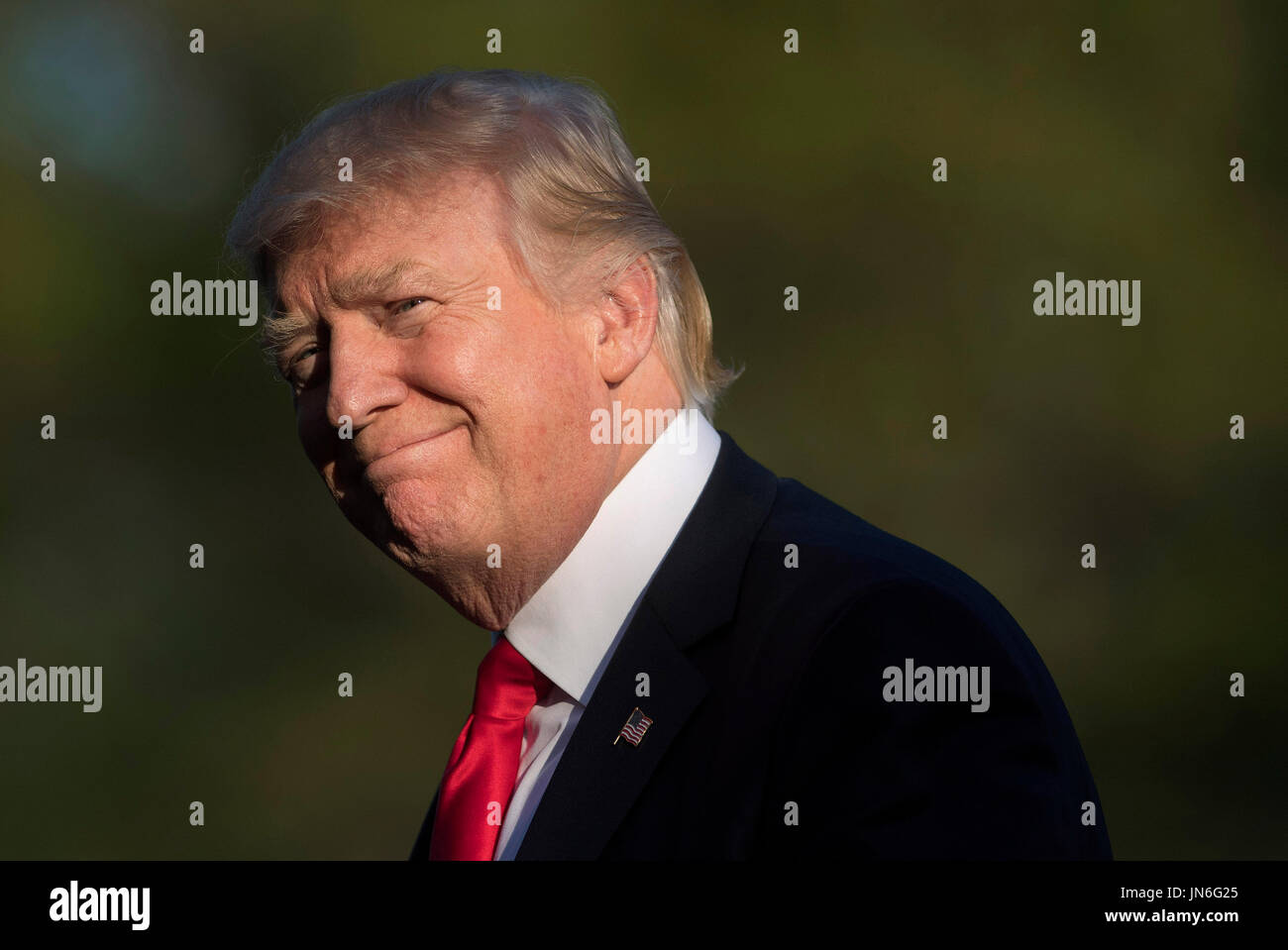 United States President Donald Trump returns to the White House after a ...