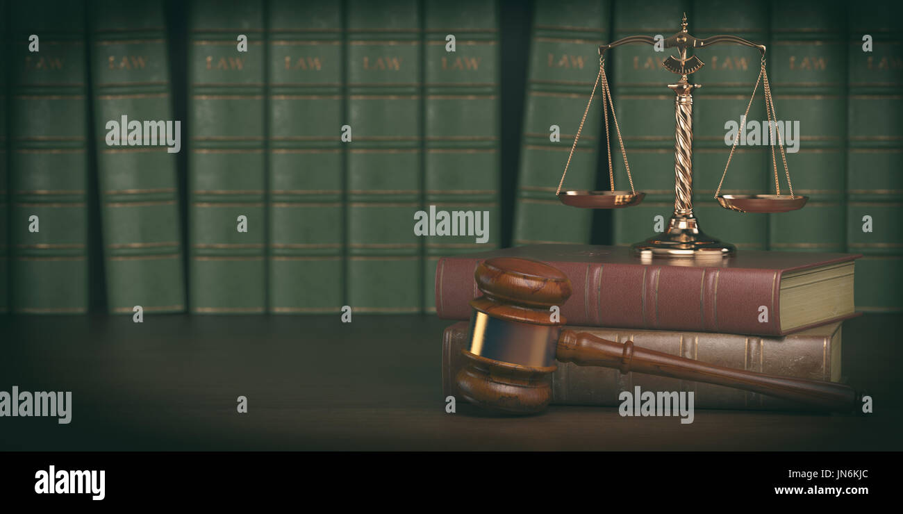 Gavel and scale on the background of vintage lawyer books. Concept of