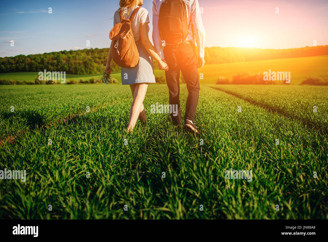 Man woman walk barefoot through hi-res stock photography and images - Alamy