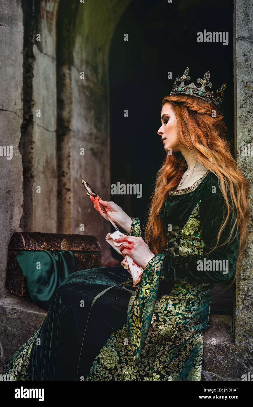 Red-haired woman in a green medieval dress near the castle Stock Photo - Alamy Red-haired woman in a green medieval dress near the castle Stock Photo - Alamy