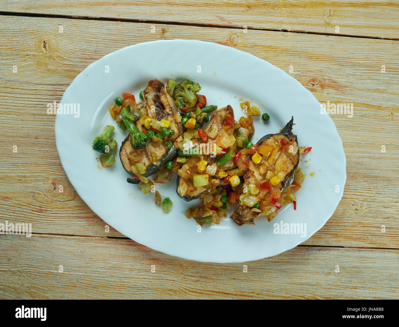 Blackened salmon with salsa ,Deep South Cajun spice Stock Photo Alamy