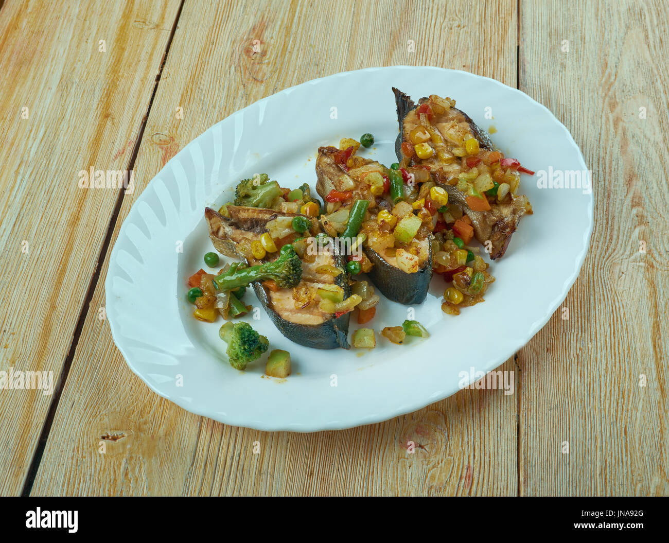 Blackened salmon with salsa ,Deep South Cajun spice Stock Photo Alamy