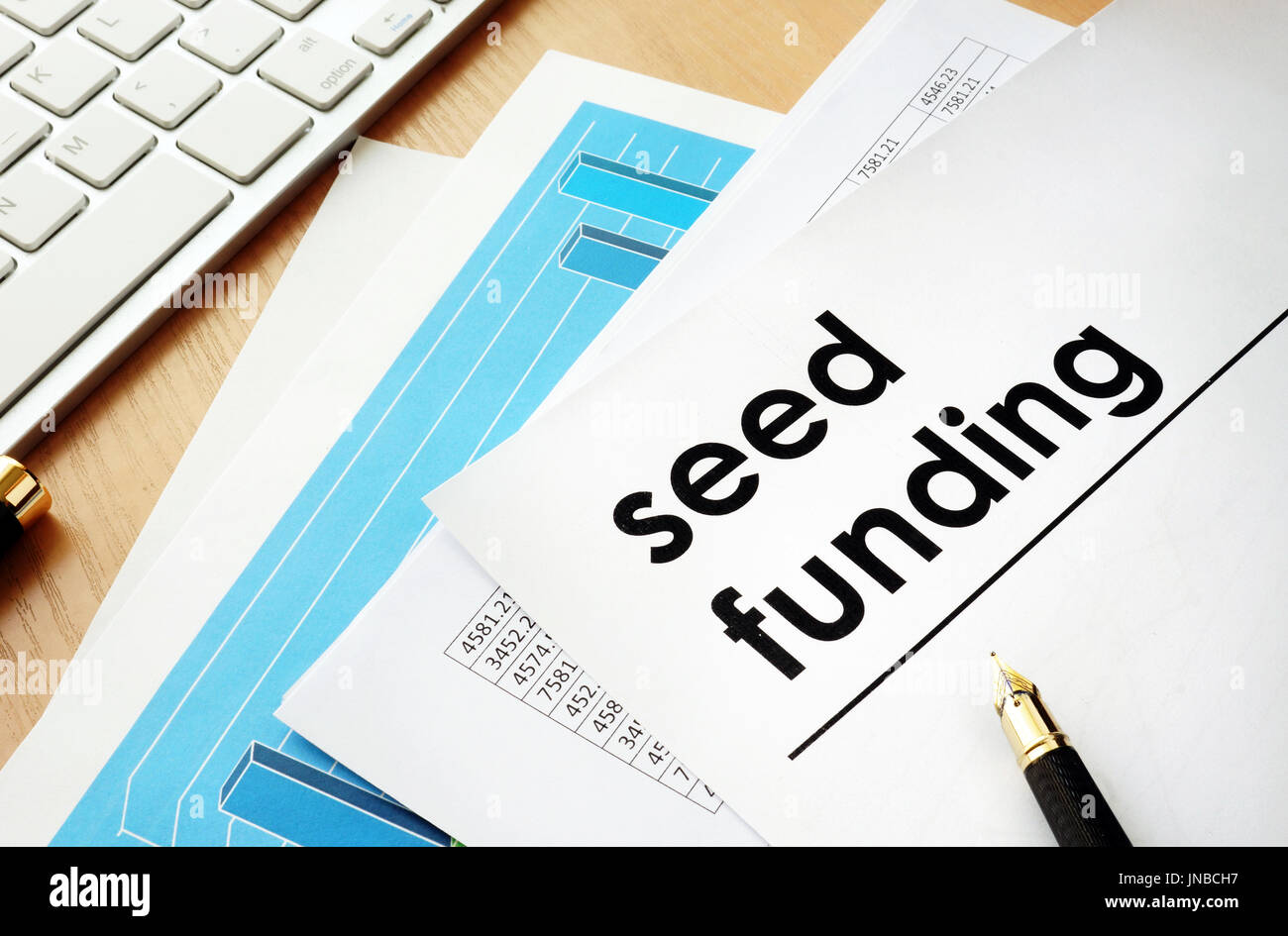 Documents with name Seed funding. Investment concept. Stock Photo