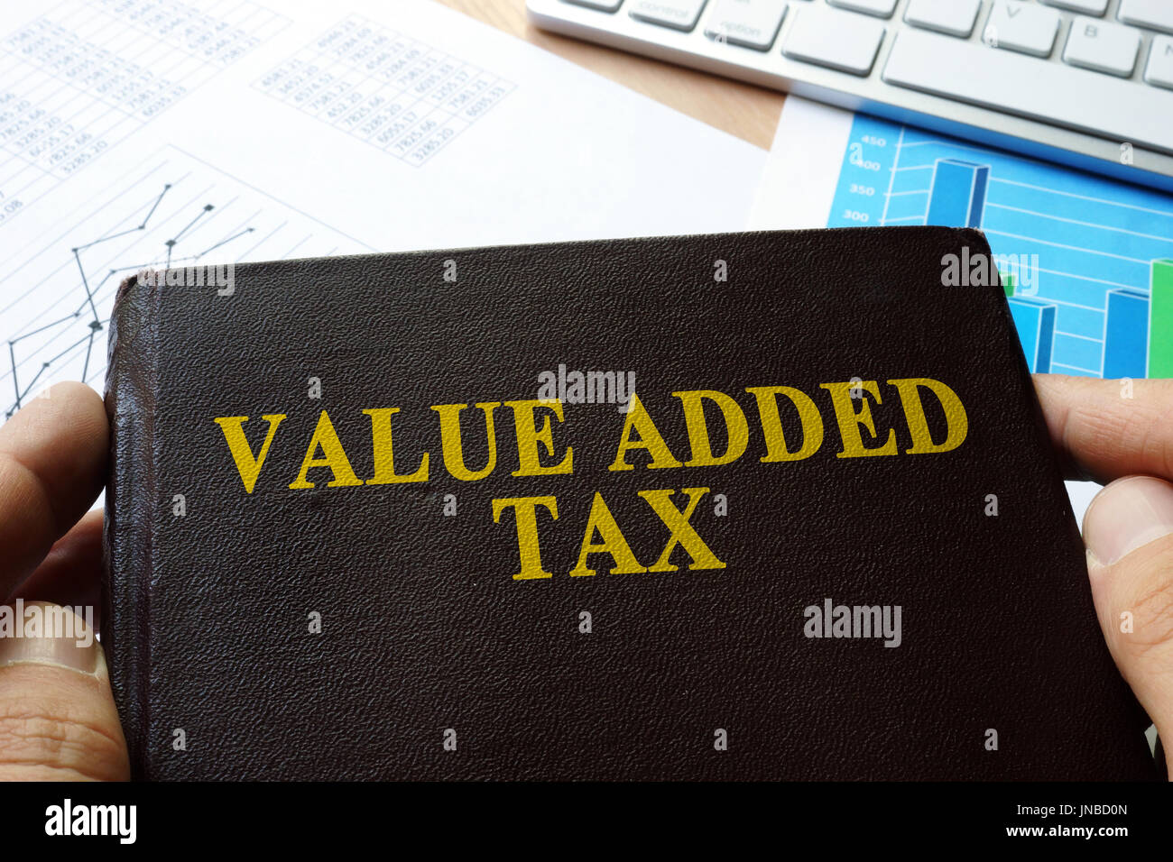 Value added tax VAT written on a front of book. Stock Photo