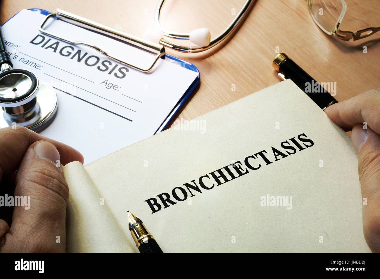 Book with title Bronchiectasis in a clinic. Stock Photo