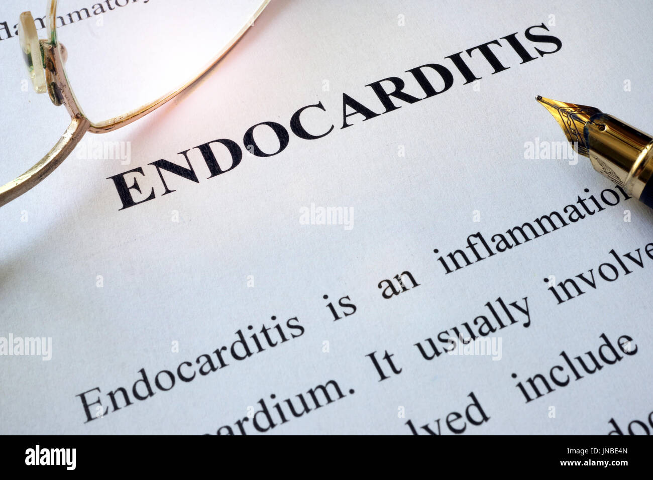 Paper with word endocarditis and glasses. Stock Photo