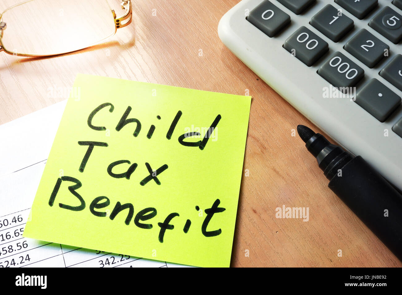 Stick with words child tax benefit. Stock Photo